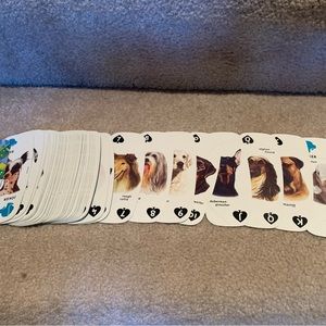 Umbra dog breed playing cards. Open but never used. Set contains 52 breeds.